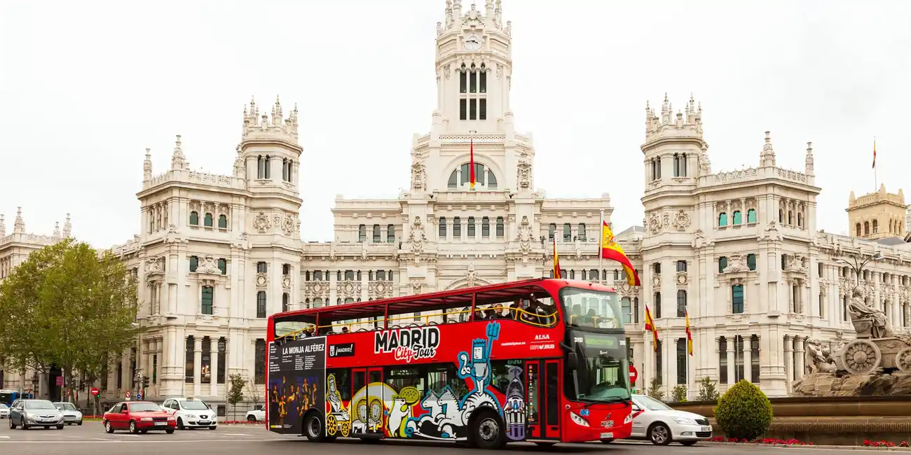 Hop on and off a bus around the Spanish capital. Hop-on Hop-off Bus Tours Ticket Madrid, Spain.